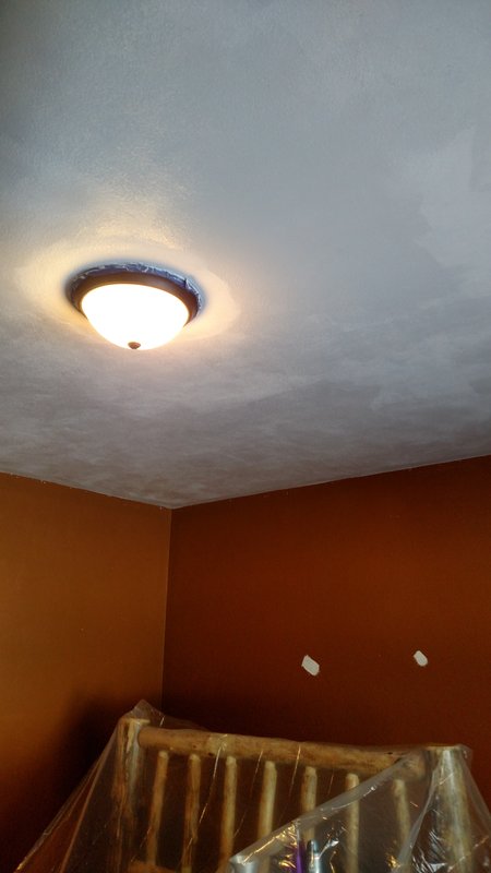Bedroom ceiling painting in progress