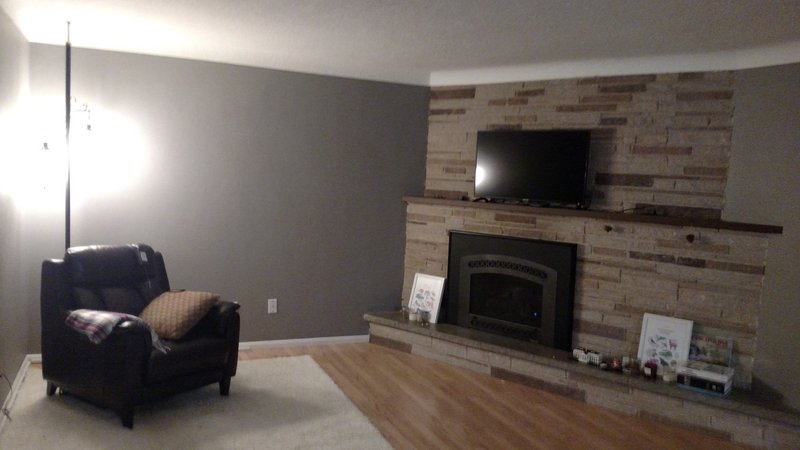Finished living room fireplace wall